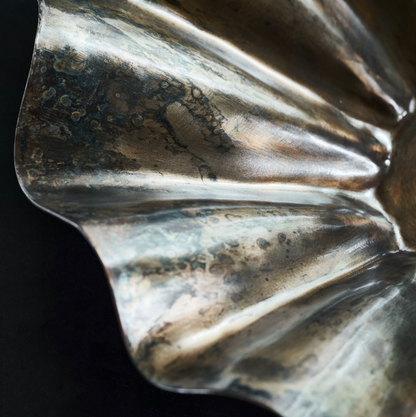 Fluted iron bowl with rustic look