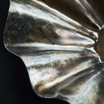 Fluted iron bowl with rustic look